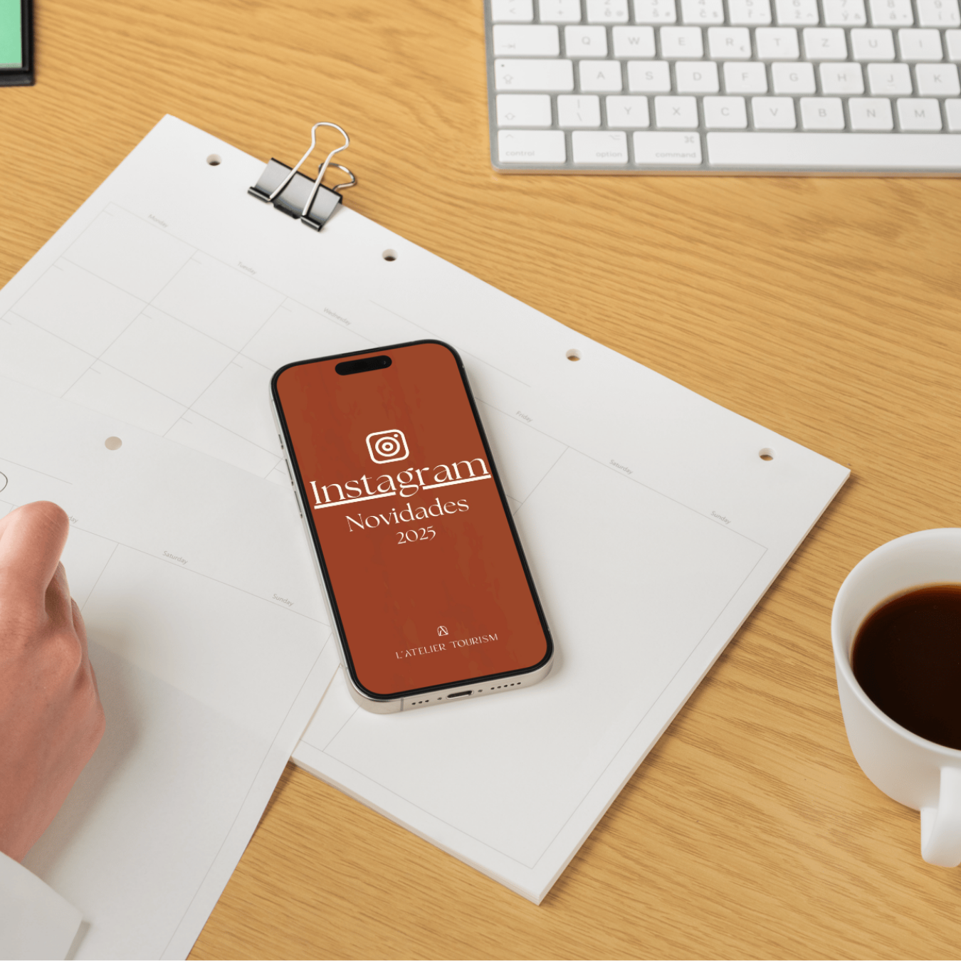 desk with a phone, coffee